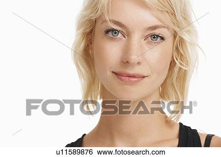 Stock Photograph - Studio portrait of attractive woman. Fotosearch