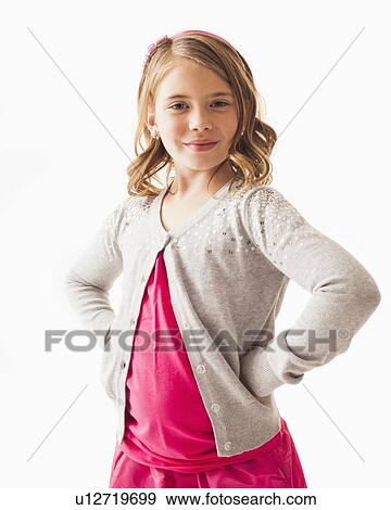 Stock Photo - Studio portrait of girl (6-7). Fotosearch