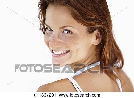 Stock Image - Studio portrait of pretty woman. Fotosearch