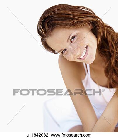 Stock Image - Studio portrait of pretty woman. Fotosearch
