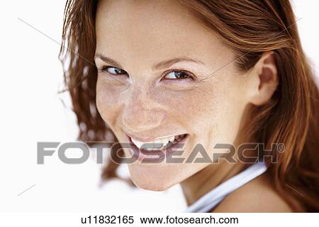Stock Photography - Studio portrait of pretty woman. Fotosearch