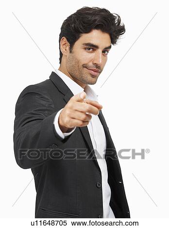 Studio portrait of stylish man pointing View Large Photo Image Stock Photography - Studio portrait of stylish man pointing. Fotosearch