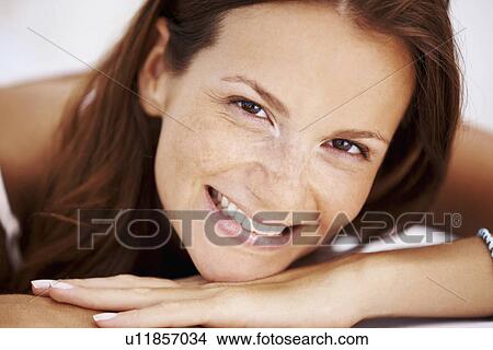 Picture - Studio portrait of woman smiling. Fotosearch