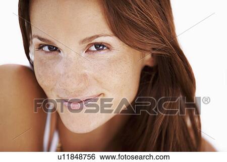 Studio portrait of woman smiling View Large Photo Image Stock Photograph - Studio portrait of woman smiling. Fotosearch