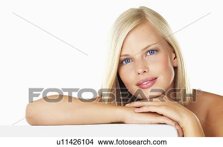 Studio portrait of young woman View Large Photo Image Picture - Studio portrait of young woman. Fotosearch