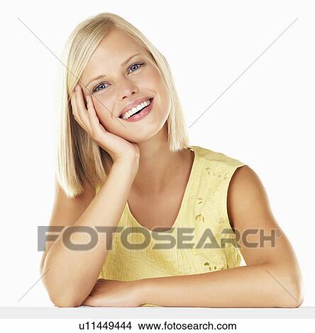 Picture - Studio portrait of young woman. Fotosearch