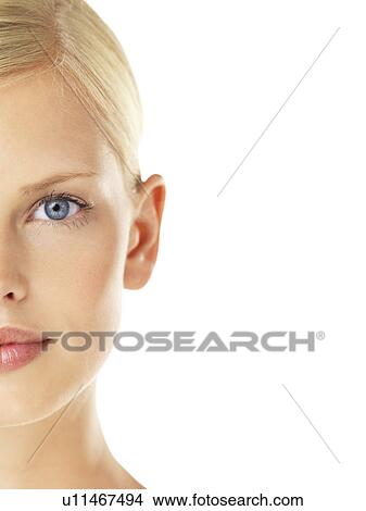 Picture - Studio portrait of young woman. Fotosearch
