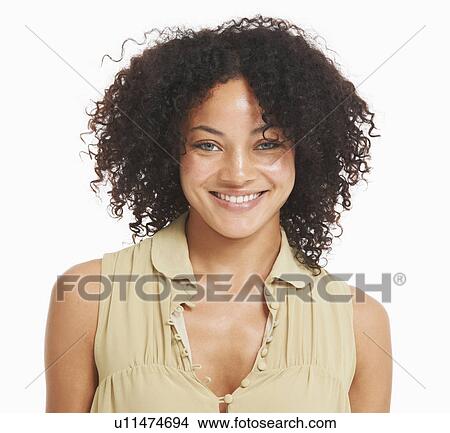 Picture - Studio portrait of young woman. Fotosearch