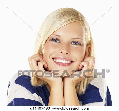 Studio portrait of young woman View Large Photo Image Stock Image - Studio portrait of young woman. Fotosearch