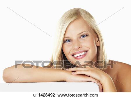 Studio portrait of young woman View Large Photo Image Stock Image - Studio portrait of young woman. Fotosearch