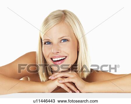 Studio portrait of young woman View Large Photo Image Stock Image - Studio portrait of young woman. Fotosearch