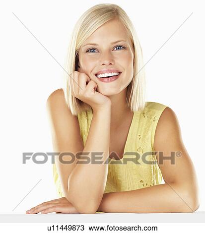 Studio portrait of young woman View Large Photo Image Stock Image - Studio portrait of young woman. Fotosearch