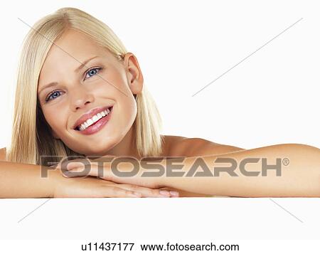 Studio portrait of young woman View Large Photo Image Stock Photo - Studio portrait of young woman. Fotosearch