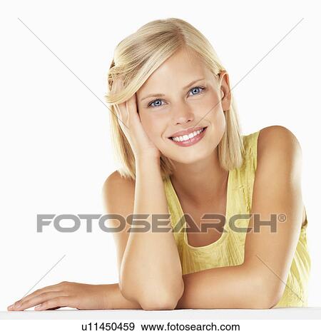 Studio portrait of young woman View Large Photo Image Stock Photo - Studio portrait of young woman. Fotosearch