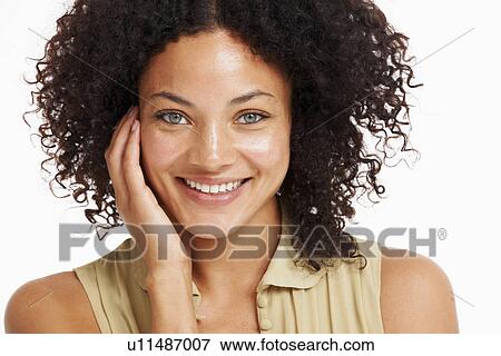 Stock Photo - Studio portrait of young woman. Fotosearch