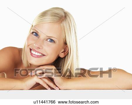 Stock Photograph - Studio portrait of young woman. Fotosearch
