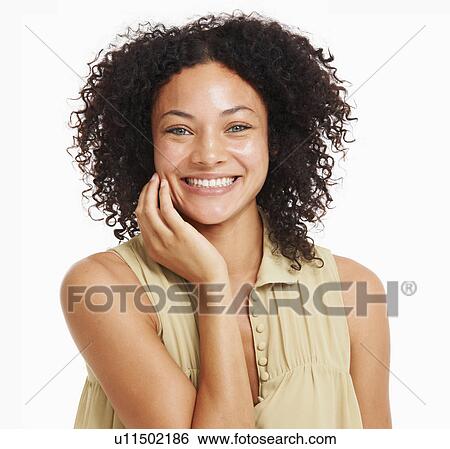 Studio portrait of young woman View Large Photo Image Stock Photograph - Studio portrait of young woman. Fotosearch