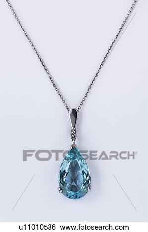 Studio shot of beautiful necklace with blue stone View Large Photo Image Stock Photograph - Studio shot of beautiful necklace with blue stone. Fotosearch