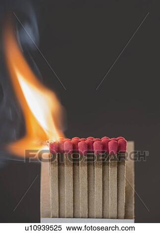 Stock Photography - Studio shot of burning matchsticks. Fotosearch