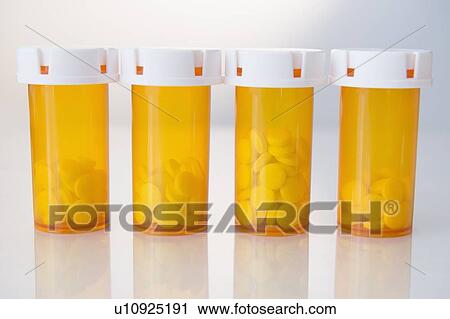 Studio shot of pill bottles View Large Photo Image Stock Image - Studio shot of pill bottles. Fotosearch