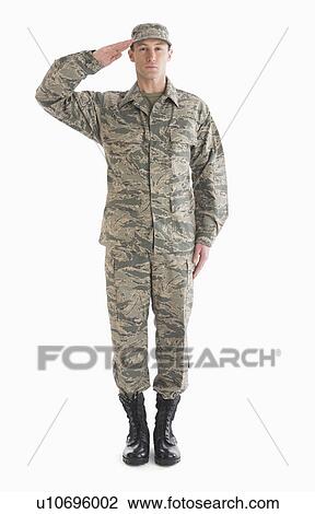 Stock Image - Studio shot of saluting soldier. Fotosearch