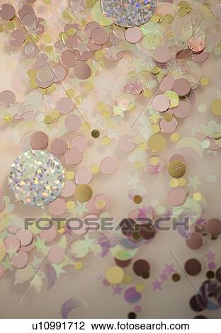 Studio shot of shiny confetti View Large Photo Image Stock Image - Studio shot of shiny confetti. Fotosearch