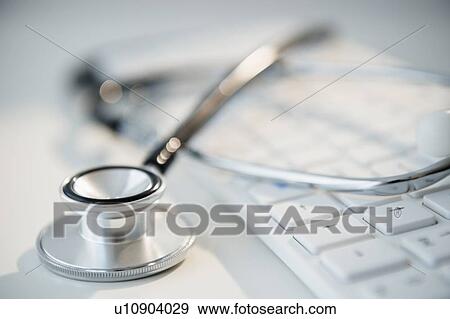 Studio shot of stethoscope and computer keyboard View Large Photo Image Stock Photo - Studio shot of stethoscope and computer keyboard. Fotosearch