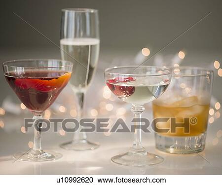 Stock Image - Studio shot of various cocktails in glasses. Fotosearch