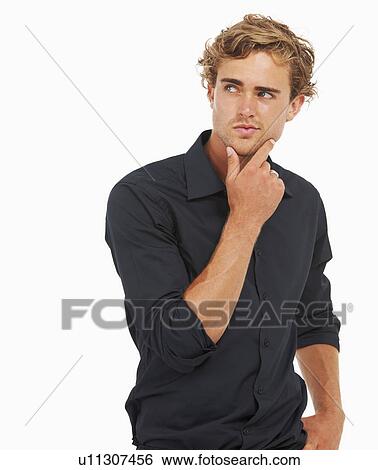 Studio Shot, Portrait of man with hand on chin View Large Photo Image Stock Photograph - Studio Shot, Portrait of man with hand on chin. Fotosearch