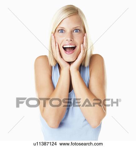 Studio Shot, Portrait of surprised young woman View Large Photo Image Picture - Studio Shot, Portrait of surprised young woman. Fotosearch
