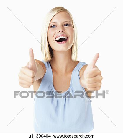 Studio Shot, Portrait of young woman with thumbs up View Large Photo Image Picture - Studio Shot, Portrait of young woman with thumbs up. Fotosearch