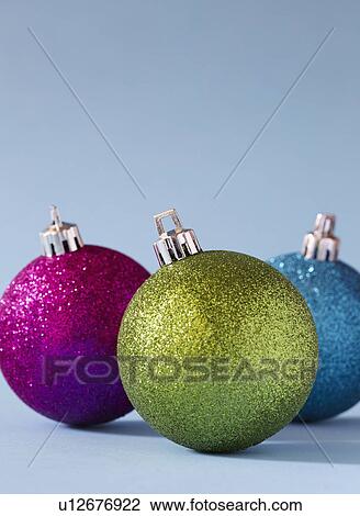 Three Christmas baubles View Large Photo Image Stock Image - Three Christmas baubles. Fotosearch