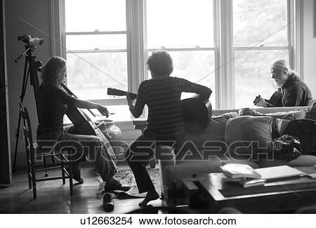 Three people playing together View Large Photo Image Picture - Three people playing together. Fotosearch