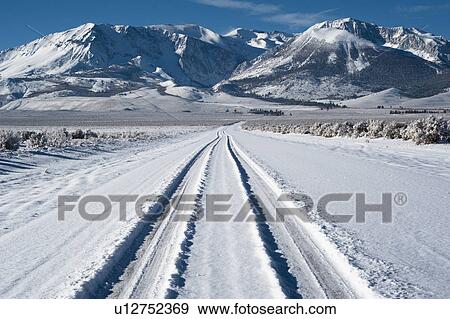 Tyre track on snow View Large Photo Image Stock Photo - Tyre track on snow. Fotosearch