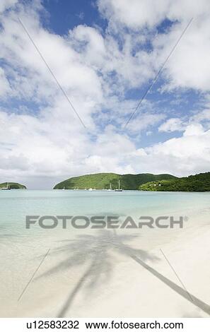 Stock Image - View of sandy beach. Fotosearch