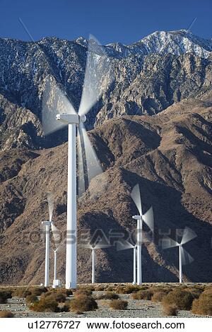 Wind turbines on desert View Large Photo Image Stock Photo - Wind turbines on desert. Fotosearch