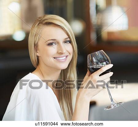 Woman drinking wine View Large Photo Image Picture - Woman drinking wine . Fotosearch