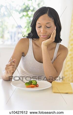 Woman eating vegetables View Large Photo Image Stock Image - Woman eating vegetables. Fotosearch