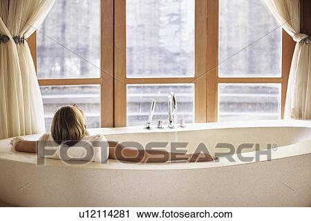 Woman enjoying bath spa View Large Photo Image Stock Image - Woman enjoying bath spa. Fotosearch