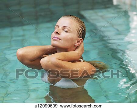 Woman enjoying bath spa View Large Photo Image Stock Photo - Woman enjoying bath spa. Fotosearch