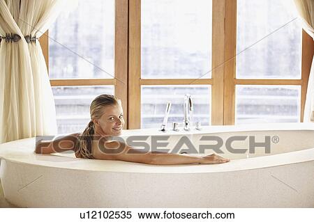 Woman enjoying bath spa View Large Photo Image Stock Photography - Woman enjoying bath spa. Fotosearch