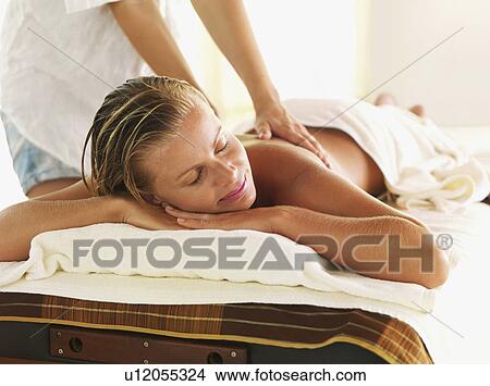 Woman getting massage in spa View Large Photo Image Picture - Woman getting massage in spa. Fotosearch