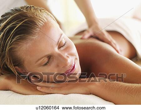 Woman getting massage in spa View Large Photo Image Picture - Woman getting massage in spa. Fotosearch