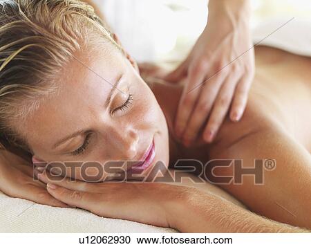 Woman getting massage in spa View Large Photo Image Stock Image - Woman getting massage in spa. Fotosearch