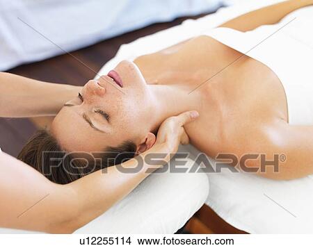 Woman receiving massage in spa View Large Photo Image Picture - Woman receiving massage in spa. Fotosearch