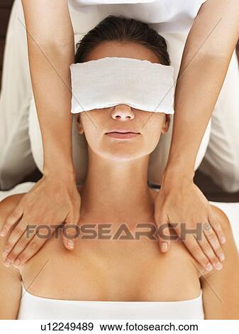 Woman receiving massage in spa View Large Photo Image Stock Photo - Woman receiving massage in spa. Fotosearch
