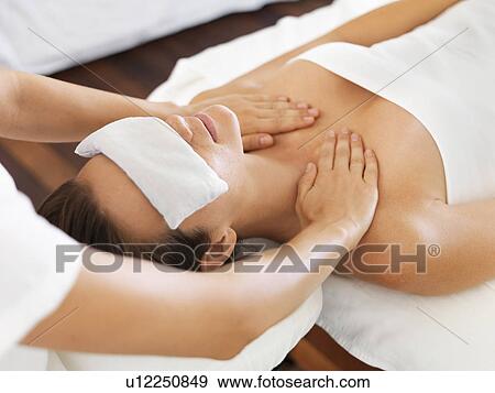 Woman receiving massage in spa View Large Photo Image Stock Photo - Woman receiving massage in spa. Fotosearch