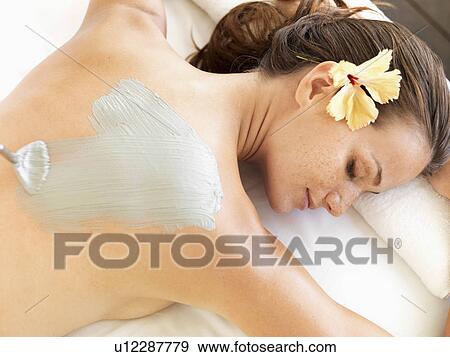 Woman receiving spa treatment View Large Photo Image Stock Photo - Woman receiving spa treatment. Fotosearch