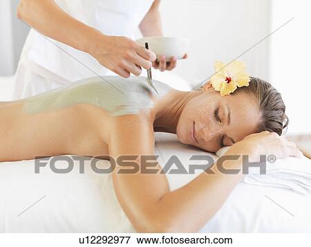 Woman receiving spa treatment View Large Photo Image Stock Photo - Woman receiving spa treatment. Fotosearch