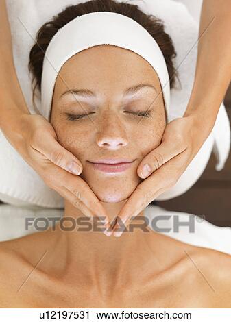 Stock Image - Woman relaxing in spa. Fotosearch